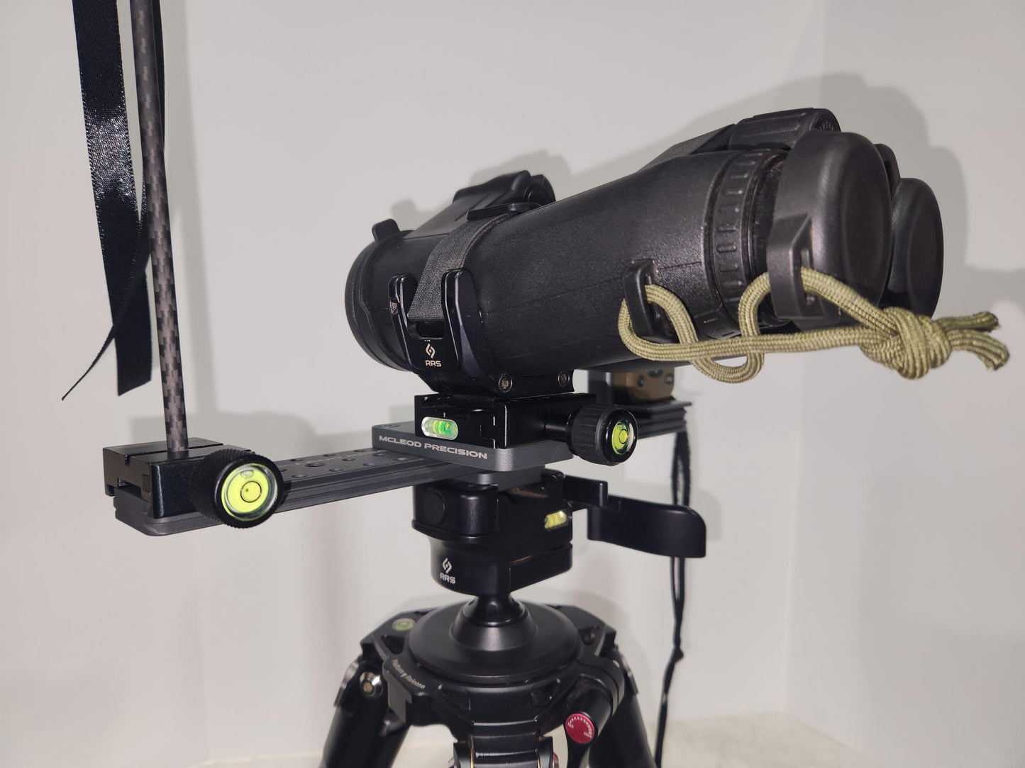 Optics Bridge installed on Tripod with binoculars and kestrel shown left side