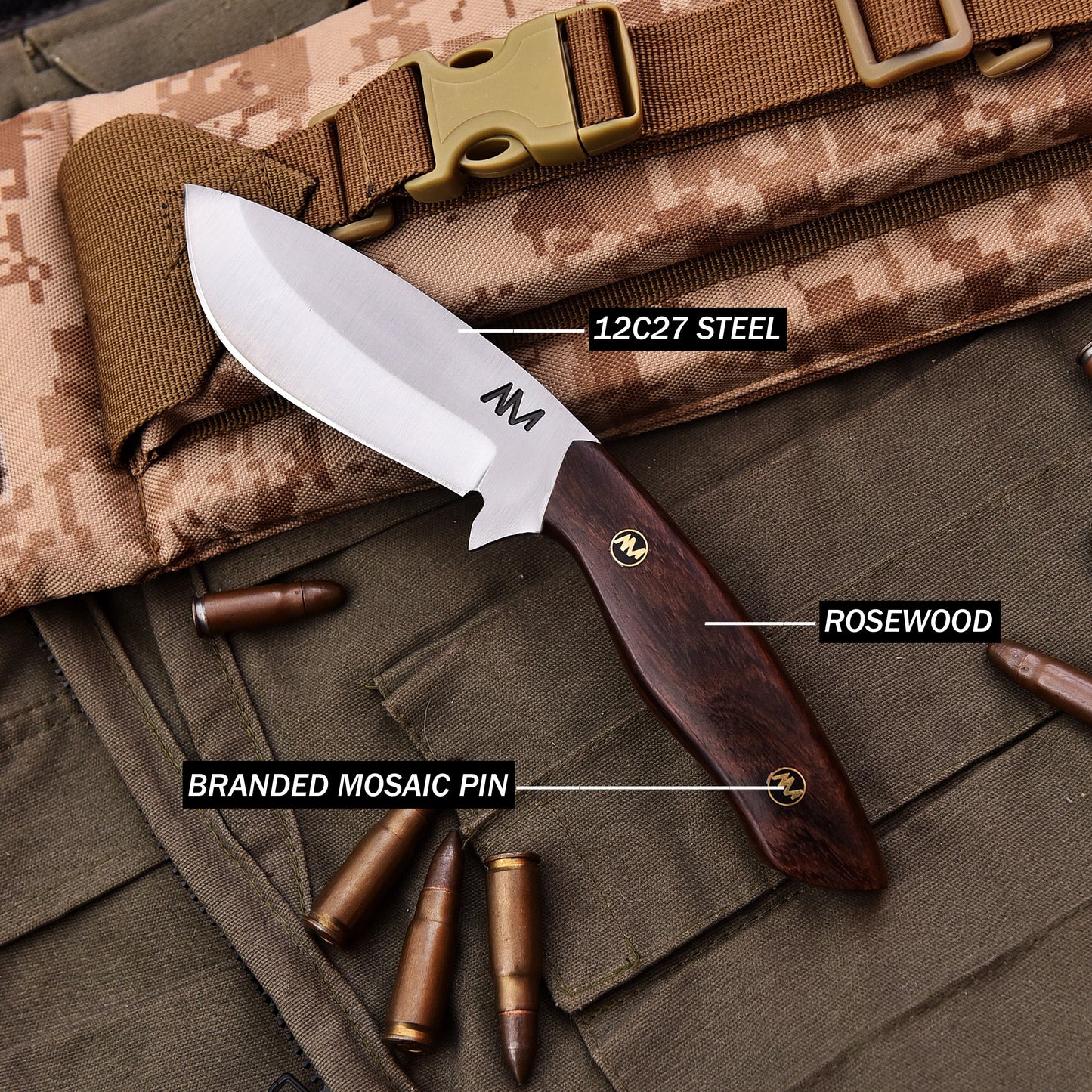 Knife with rosewood handle and branded mosaic pin on camouflage fabric with bullets